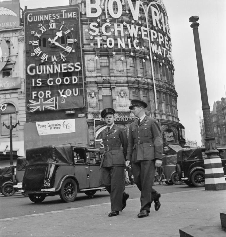 Guinness slogan in 1942, Piccadilly Circus, London. Public domain. Guinness slogan in 1942, Piccadilly Circus, London. Public domain.