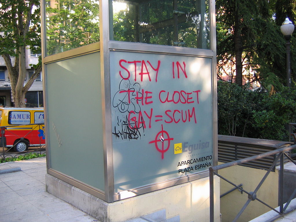 "Stay in the closet; gay=scum", followed by a neo-Nazi Celtic cross symbol. This graffiti was made in Madrid, Spain during the EuroPride 2007. Photo by José María Mateos. "Stay in the closet; gay=scum", followed by a neo-Nazi Celtic cross symbol. This graffiti was made in Madrid, Spain during the EuroPride 2007. Photo by José María Mateos.