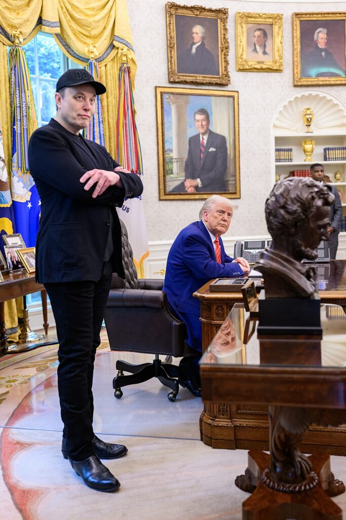 Elon Musk and Donald Trump during Musk's May 2025 sendoff in the Oval Office. Public domain. Elon Musk and Donald Trump during Musk's May 2025 sendoff in the Oval Office. Public domain.