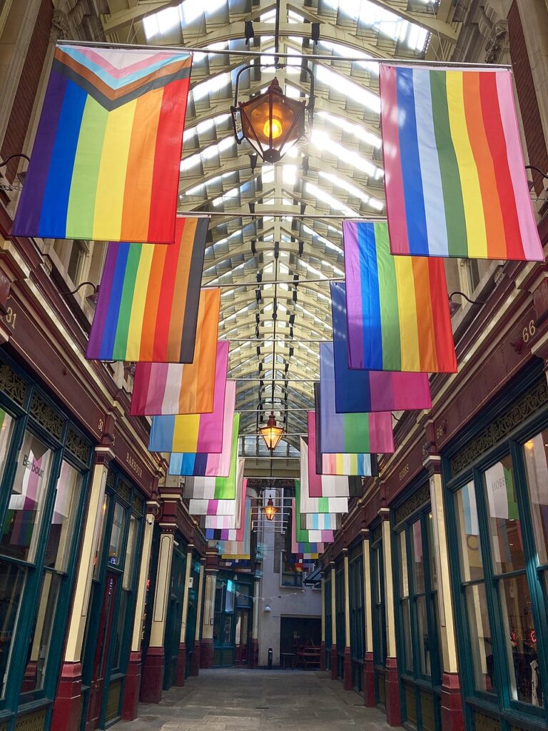A collection of pride flags hanging in London's Leadenhall Market, 2021. Photo by Matt Brown. A collection of pride flags hanging in London's Leadenhall Market, 2021. Photo by Matt Brown.