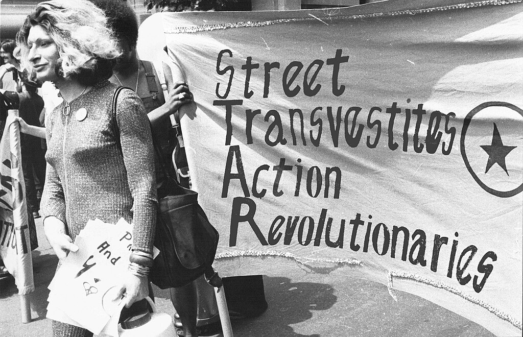 Sylvia Rivera with STAR banner in 1970. Photo by Roseleechs. Sylvia Rivera with STAR banner in 1970. Photo by Roseleechs.