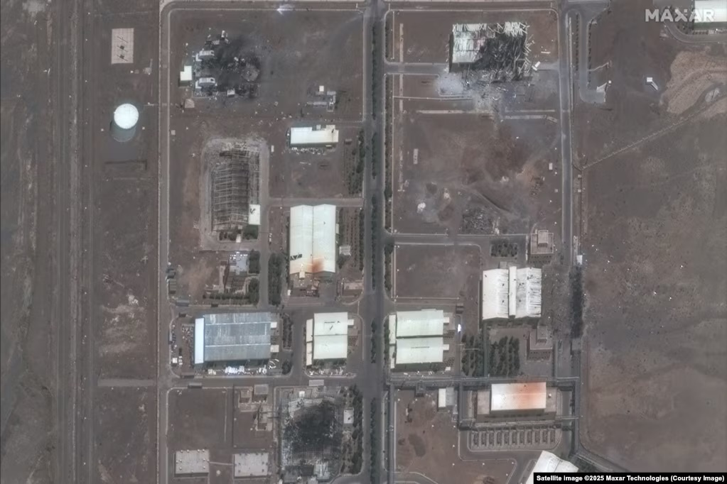 Aerial satellite view showing damage at Iran's Natanz nuclear facility, a key location in the nuclear aspect of the Israel-Iran conflict. Photo by Maxar Technologies. Aerial satellite view showing damage at Iran's Natanz nuclear facility, a key location in the nuclear aspect of the Israel-Iran conflict. Photo by Maxar Technologies.